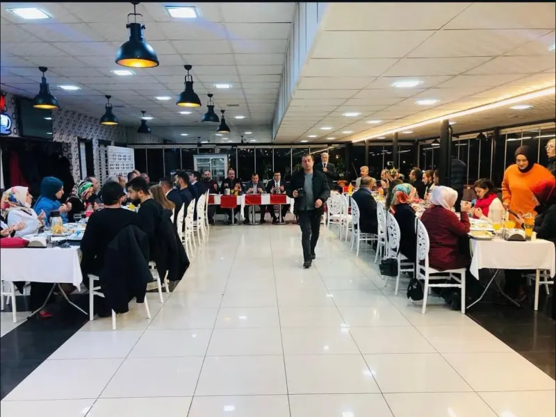 The long Terrace Hall with tables set and guests seated